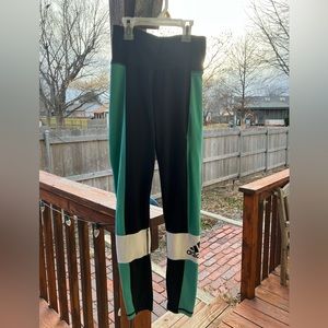 Women’s Adidas tights size XS. Inseam 25”. Hidden pocket in waist band.